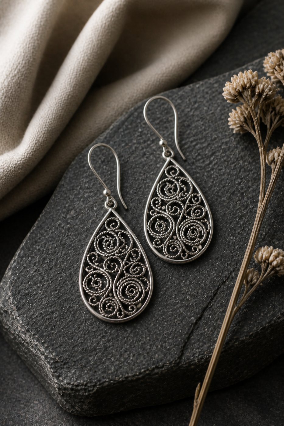 Aretes Quillu en plata 950, fotografía de estudio
